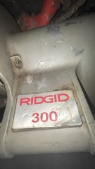 Ridgid model 300 120-volt pipe threading machine with stands