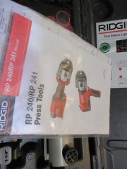 RIDGID RP240 Tool Kit 2 batteries, 4 press heads looks ok works great, in case