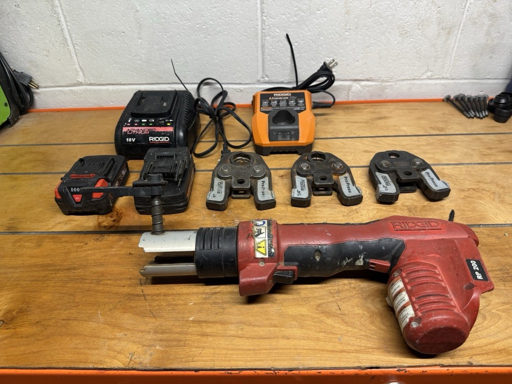 Ridgid RP 200 Press Tool Kit w/3 Jaws, 2 Battery, And 2 Chargers.