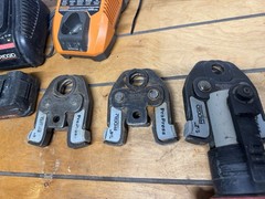 Ridgid RP 200 Press Tool Kit w/3 Jaws, 2 Battery, And 2 Chargers.