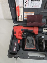 Ridgid RP 200-B Compact Press Tool Kit w/4 Jaws, Battery, And Case Used