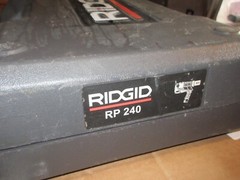 RIDGID RP240 Tool Kit 2 batteries, 4 press heads looks ok works great, in case