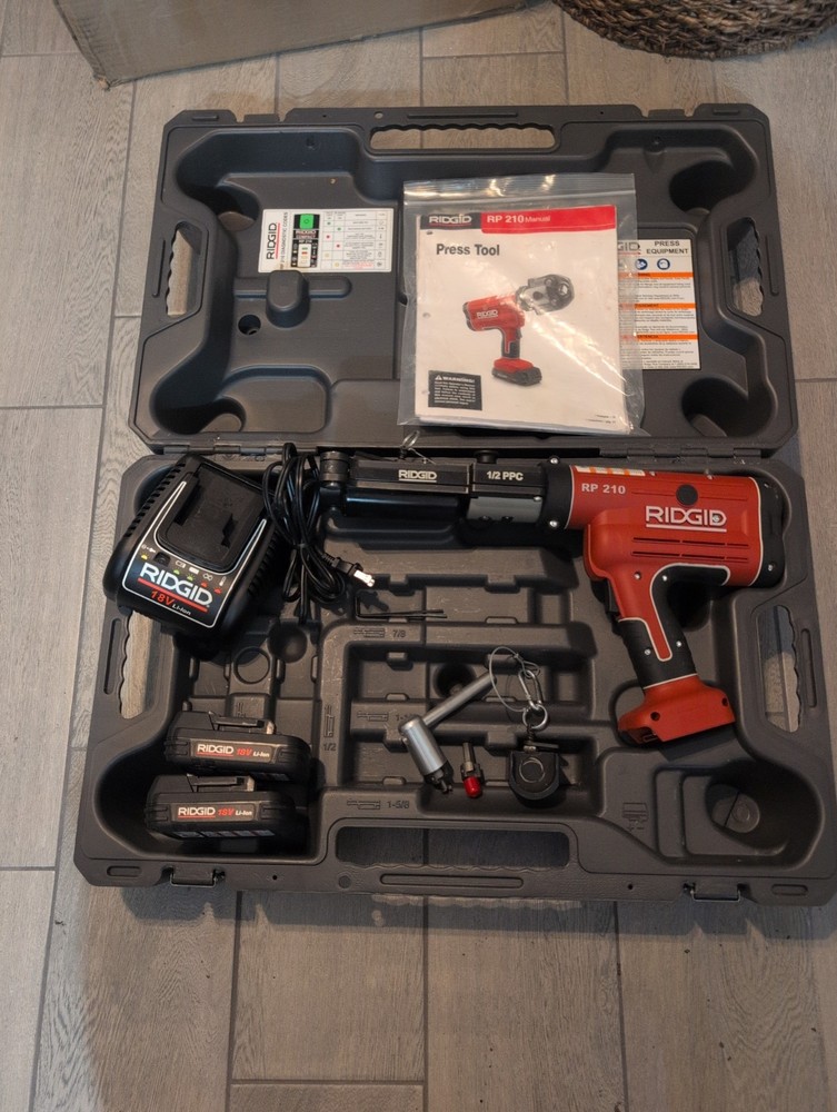 Nice RIDGID RP 210 Press Tool Kit for PEX with 2 Batteries ,Charger, 1/2 Clamps