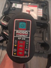 Nice RIDGID RP 210 Press Tool Kit for PEX with 2 Batteries ,Charger, 1/2 Clamps